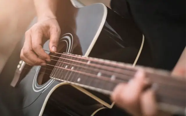 Acoustic or classical for fingerstyle: which is harder on the fingers?