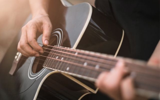 Acoustic or classical for fingerstyle: which is harder on the fingers?